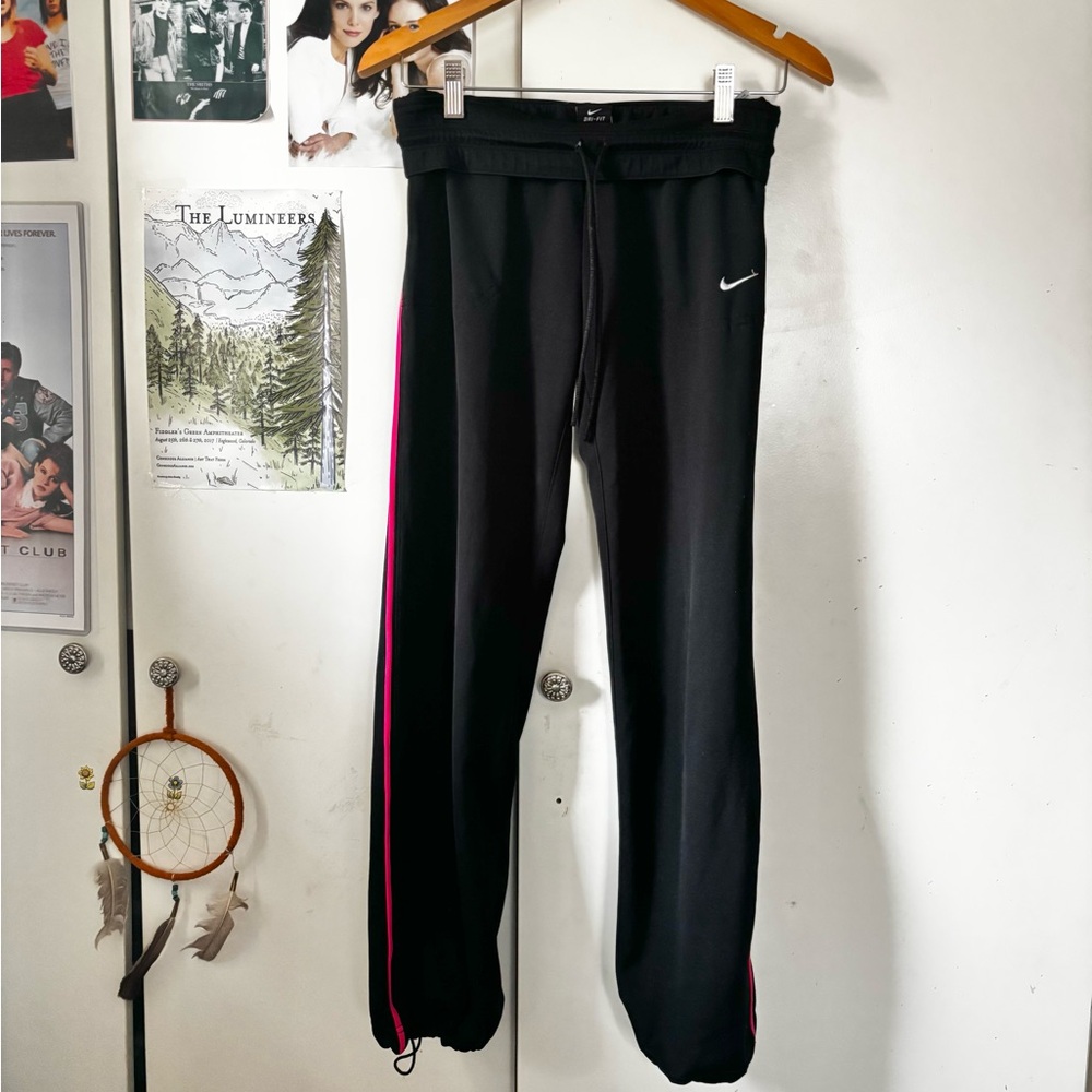 Black Nike womens Track Pants with Pink stripe